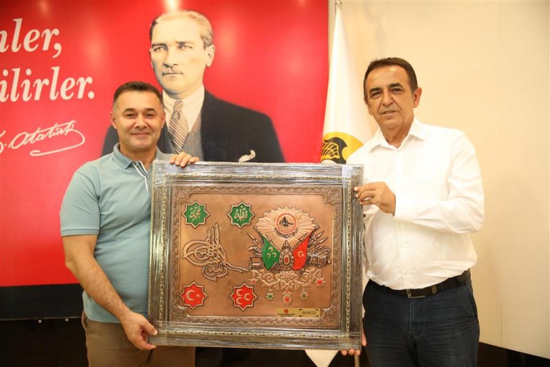 Mhp ilçe başkanı ve yeni yönetiminden başkan yücel’e ziyaret