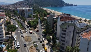 Alanya belediyesi’nden güzelyalı caddesi’nde sıcak asfalt çalışması